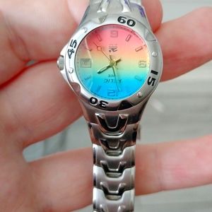 RELIC Wet Quartz Analog Date Ladies Watch Rare Rainbow Dial SS Water Resist